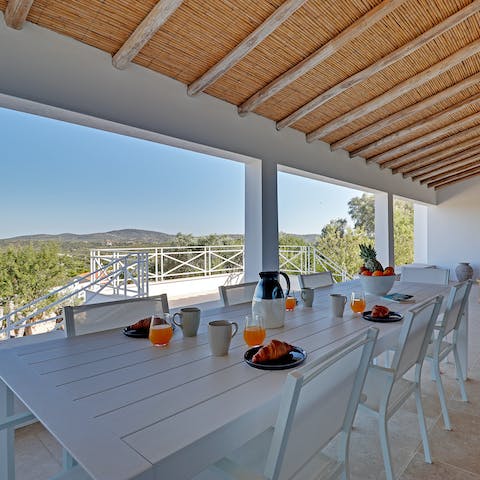 Enjoy breakfast on the covered terrace as you soak up the scenery