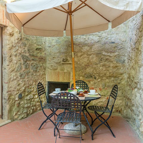 Sit down for an evening glass of wine in the courtyard