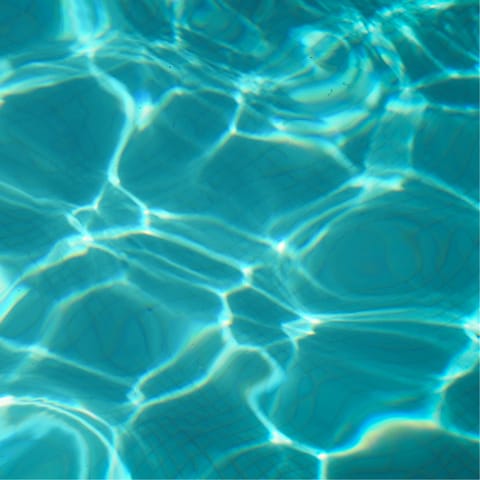 Head to the communal swimming pool for a refreshing dip