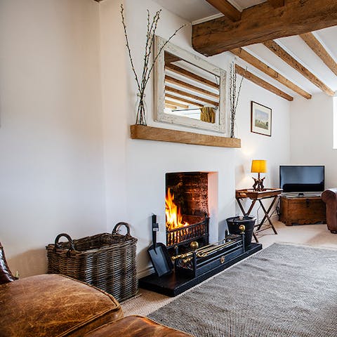 Snuggle up on the sofas in front of the open fire