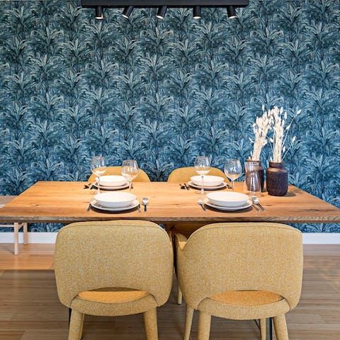 Prepare homecooked meals and enjoy sociable evenings around the wooden dining table