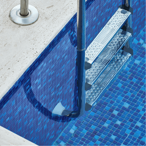 Take a dip in the communal rooftop pool