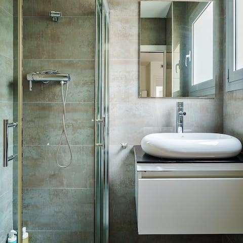 Get mornings off to a relaxing start in the marble master bathroom