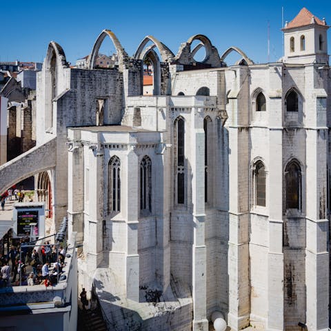 Visit the Convento do Carmo, a twelve-minute walk away