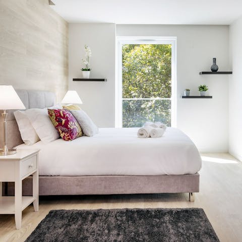 Wake up feeling rested and ready in the stylish master bedroom