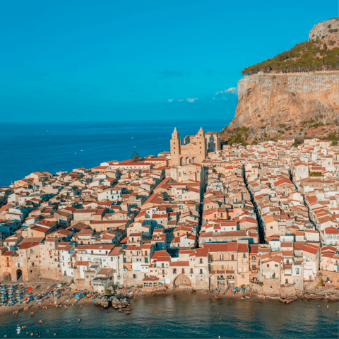 Explore the golden beaches and ancient ruins of charming Cefalù