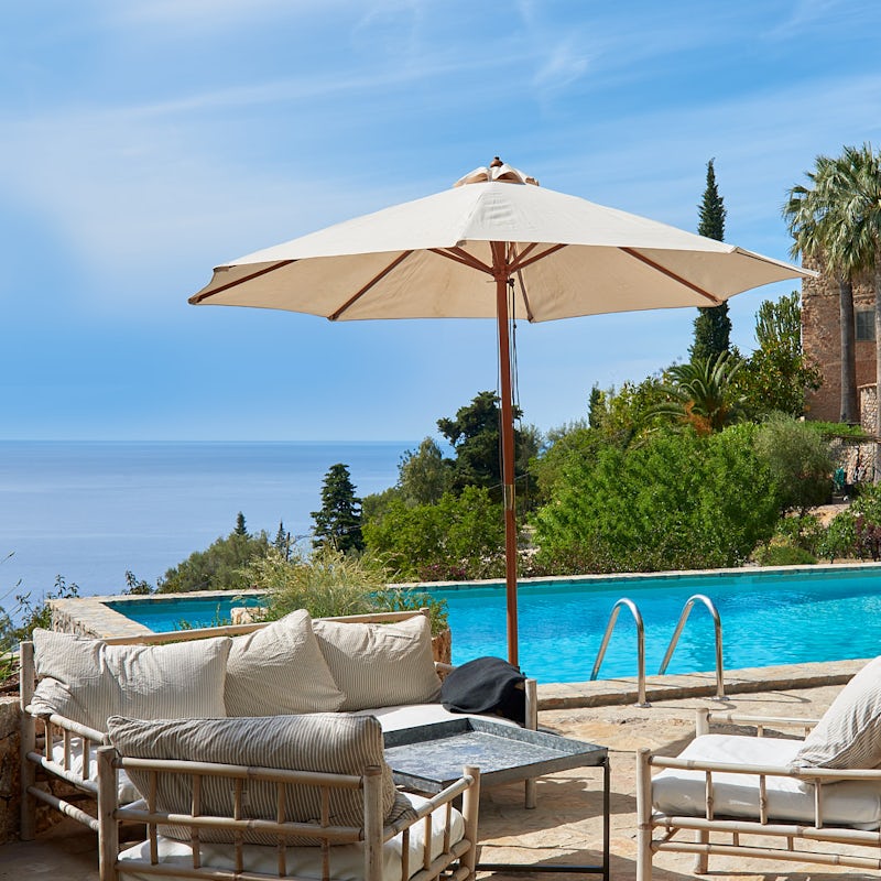 Sip drinks poolside with sea views