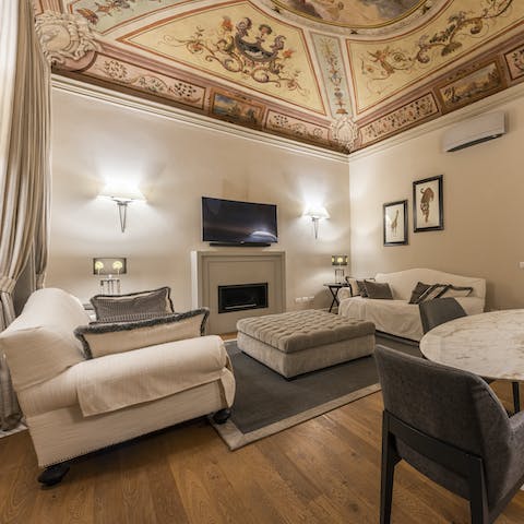 Settle down for a movie night with loved ones under the frescoed ceiling 
