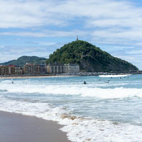 Walk six minutes to sink your toes in the sands of Zurriola beach