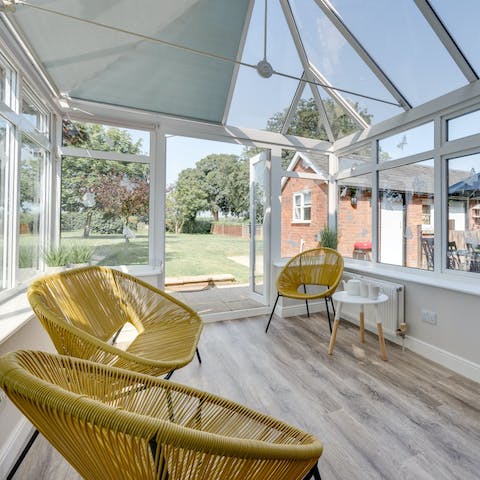 Welcome a new day with a cup of coffee in the conservatory