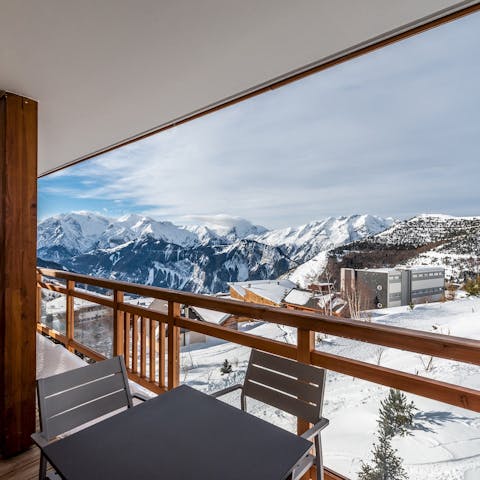 Take in the gorgeous mountain views from the balcony