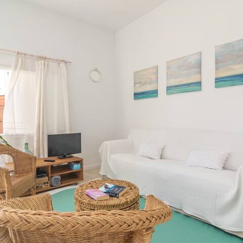 Relax in the cool of your breezy, beachy living room