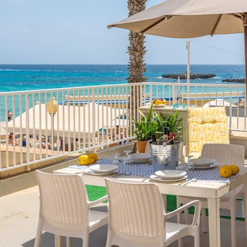 Take in the sea view from your private terrace while you dine