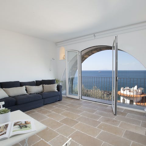 Enjoy ocean views from practically every spot in your dreamy apartment