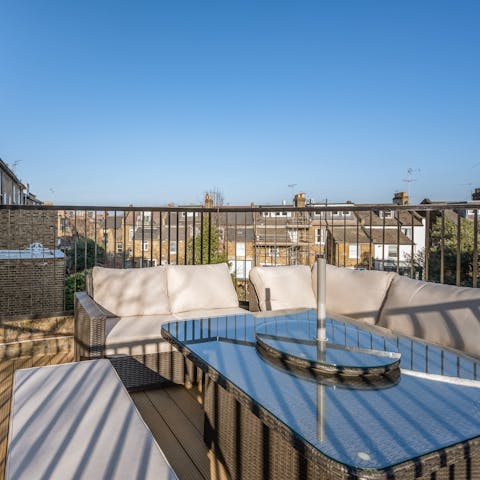 Enjoy a barbeque out on the terrace with a glass of London ale 