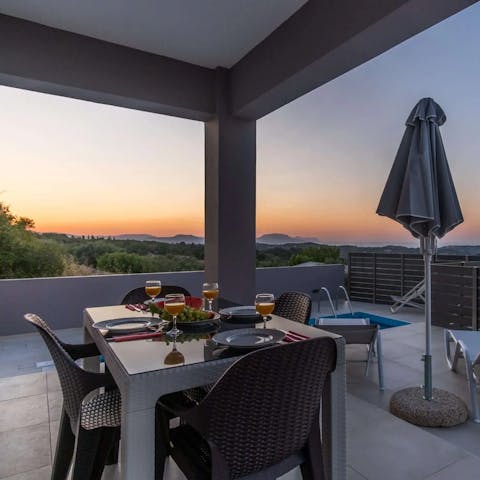 Dine on the terrace as the sun sets over the rolling hills