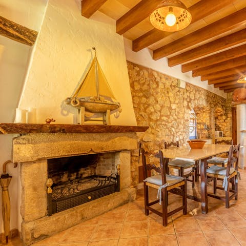 Stoke the grand fireplace for a cosy evening over a glass of Spanish wine