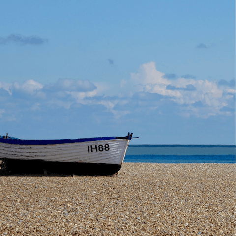 Walk fifteen minutes to Aldeburgh Beach and watch the boats on the water