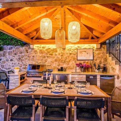 Whip up a feast for everyone in the outdoor stone kitchen