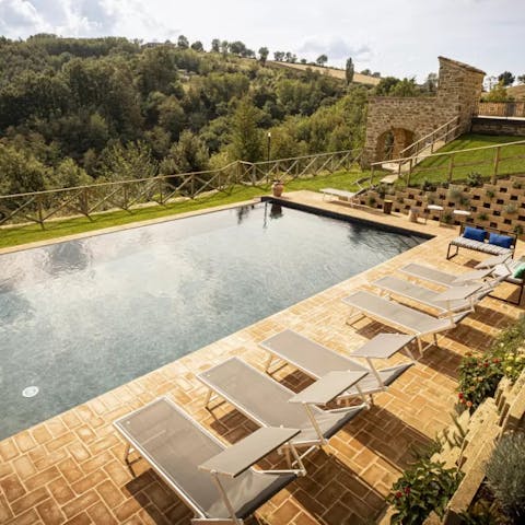 Laze around the private swimming pool after a day trip to Perugia