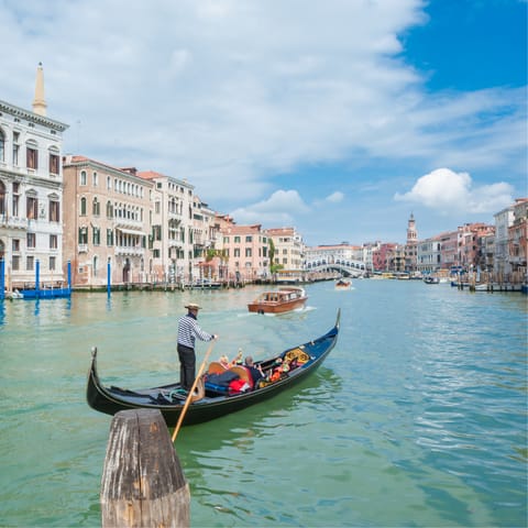 Hop on a gondola and explore the charming city of Venice