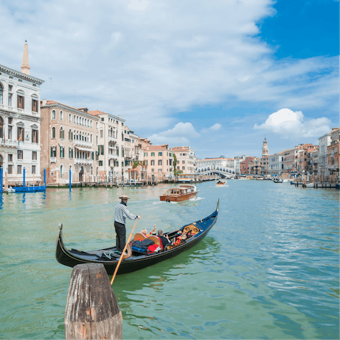 Hop on a gondola and explore the charming city of Venice