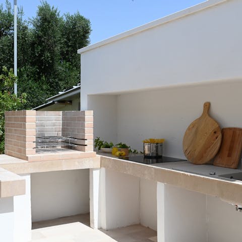 Try your hand at cooking your favourite Italian dishes in the outdoor kitchen