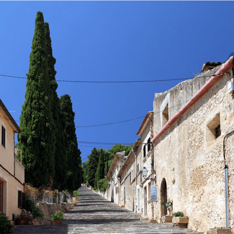 Soak up the tradition and culture of nearby Pollença, a short walk from the villa