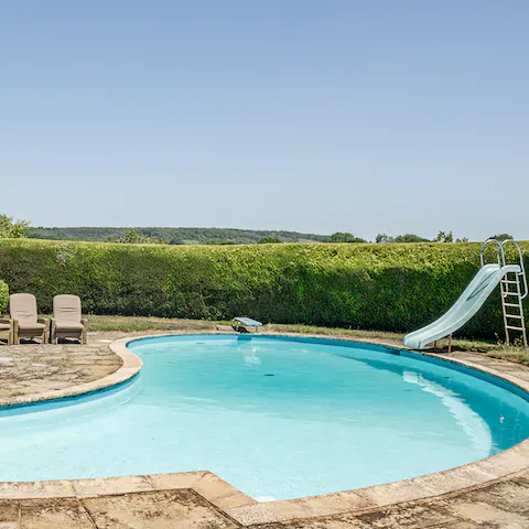 Jump into your private pool in the home's magnificent grounds