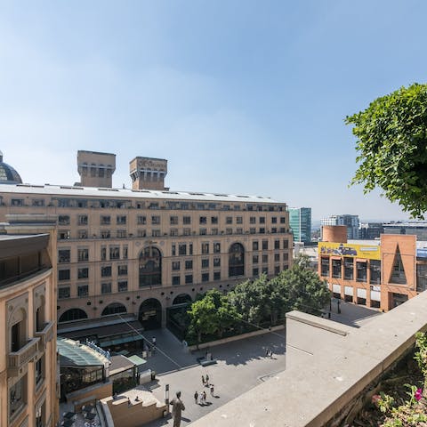 Soak up the sun from your private balcony overlooking Nelson Mandela Square