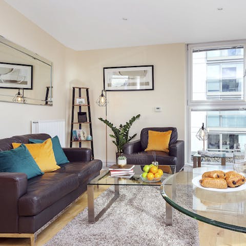 Relax and unwind in the stylish living room after a day of London sightseeing