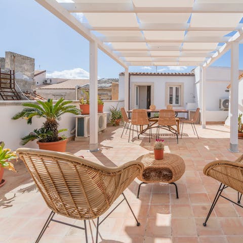 Relax on the terrace with your holiday read under the Sicilian sun