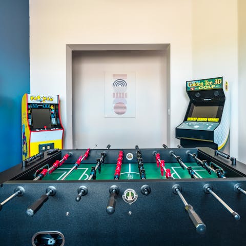 Get competitive with a few rounds of foosball in the games room