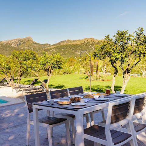 Tuck into breakfast on the terrace and drink in the mountain views