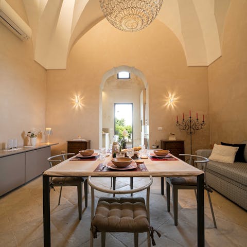 Gather together for a celebratory dinner in the grand living area with its vaulted ceilings