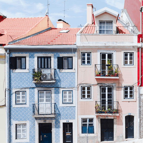 Wander past pastel-coloured mansion apartments as you explore the charms of the Príncipe Real neighbourhood