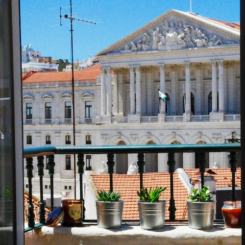 Gaze out over the breathtaking Palácio de São Bento from your third-floor apartment