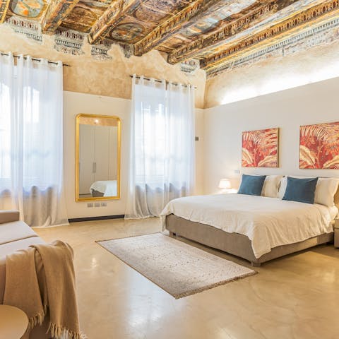 Drift off beneath the gorgeous painted ceilings