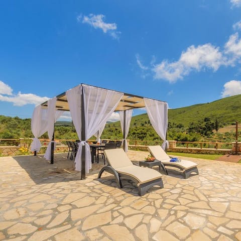 Bask in the Mediterranean sunshine on the loungers