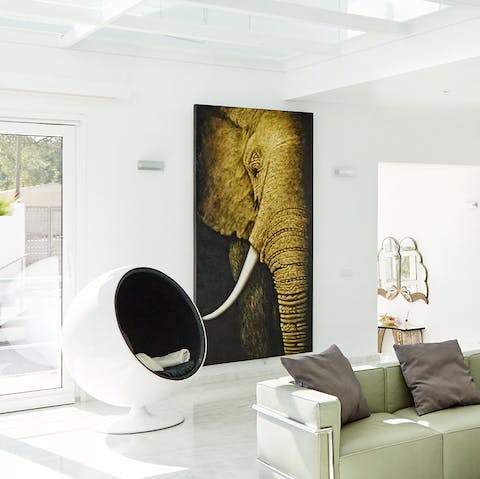Relax in a home replete with quirky artwork