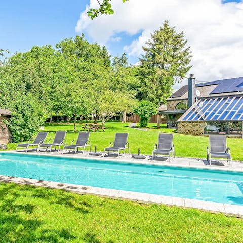 Swim laps of the pool or lounge poolside in the sun