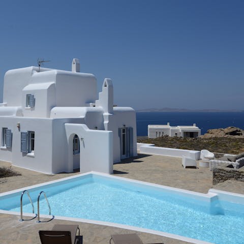 Swim in the private pool overlooking the sea