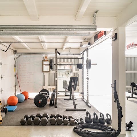 Work up a sweat in the well-equipped home gym