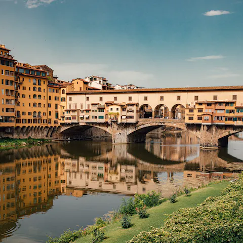 Stroll across Ponte Vecchio, a four-minute walk away