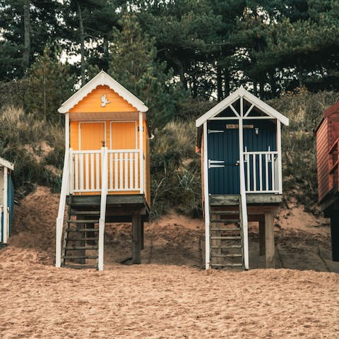 Hire a beach hut at Mundesley Beach, an eight-minute stroll away