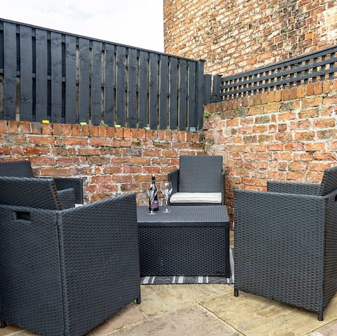 Relax at the seating area outside on the patio