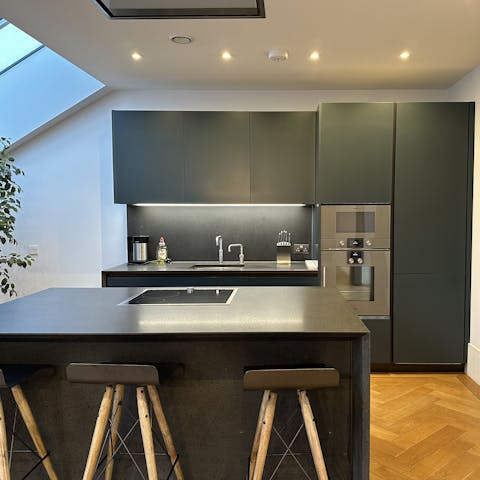 Perch at the breakfast bar while a fry-up sizzles on the stove