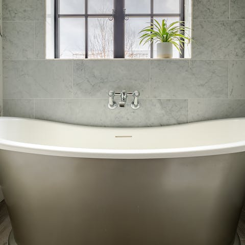 Indulge in luxuriant soak in the glorious freestanding tub