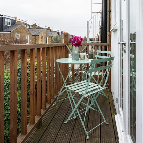 Enjoy a morning coffee or an evening tipple on the private balcony