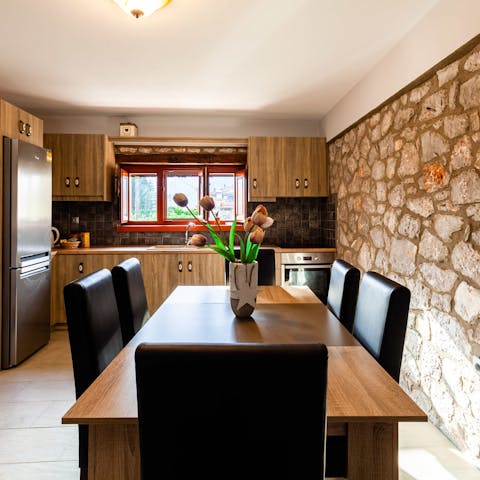 Prepare a meze platter and enjoy it together in this open kitchen and dining space